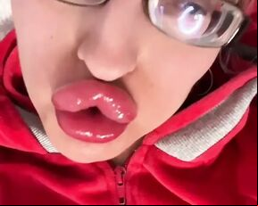 Captivated by the of Big Lips and Glossy Kisses